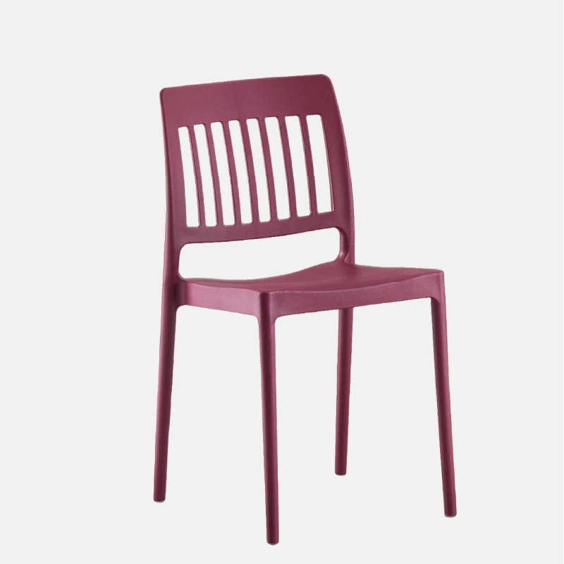 Chaise sans accoudoirs en plastique de couleur rouge
