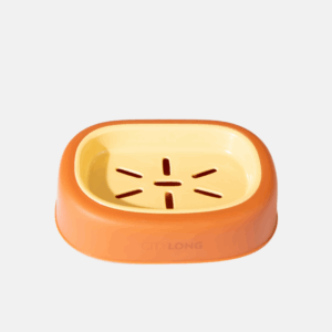 Porte savon en plastique de couleur orange.