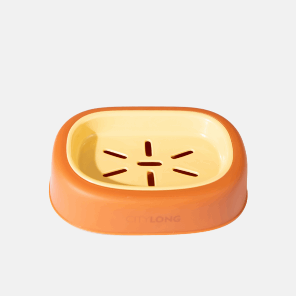 Porte savon en plastique de couleur orange.