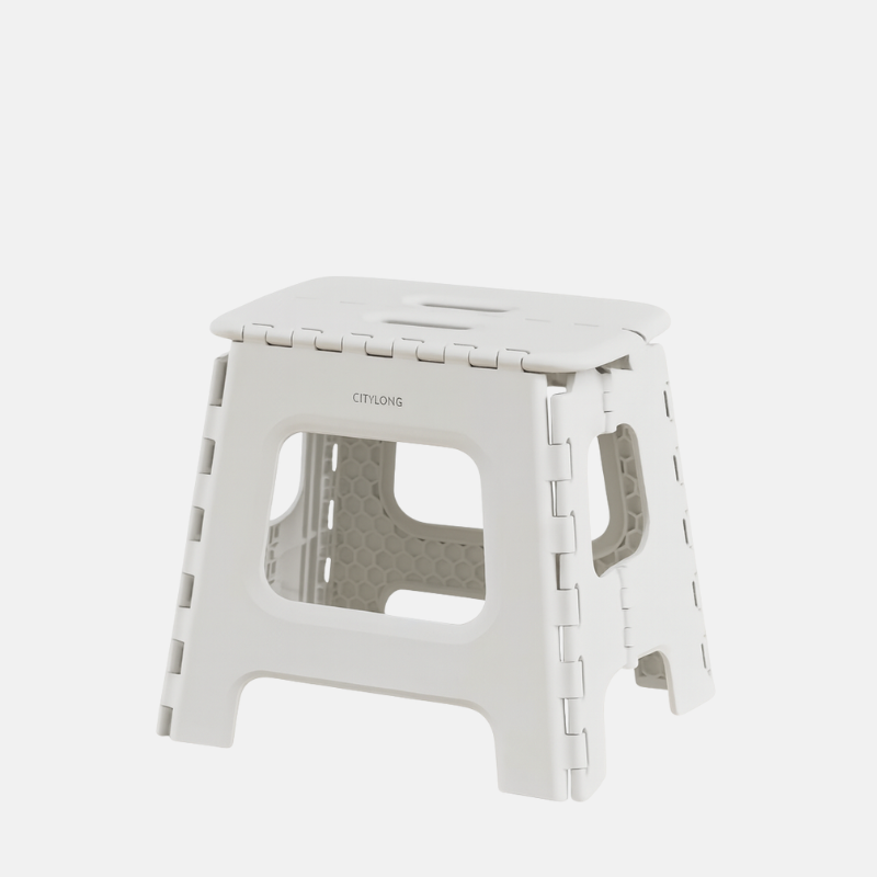 Tabouret en plastique pliable de taille médium.