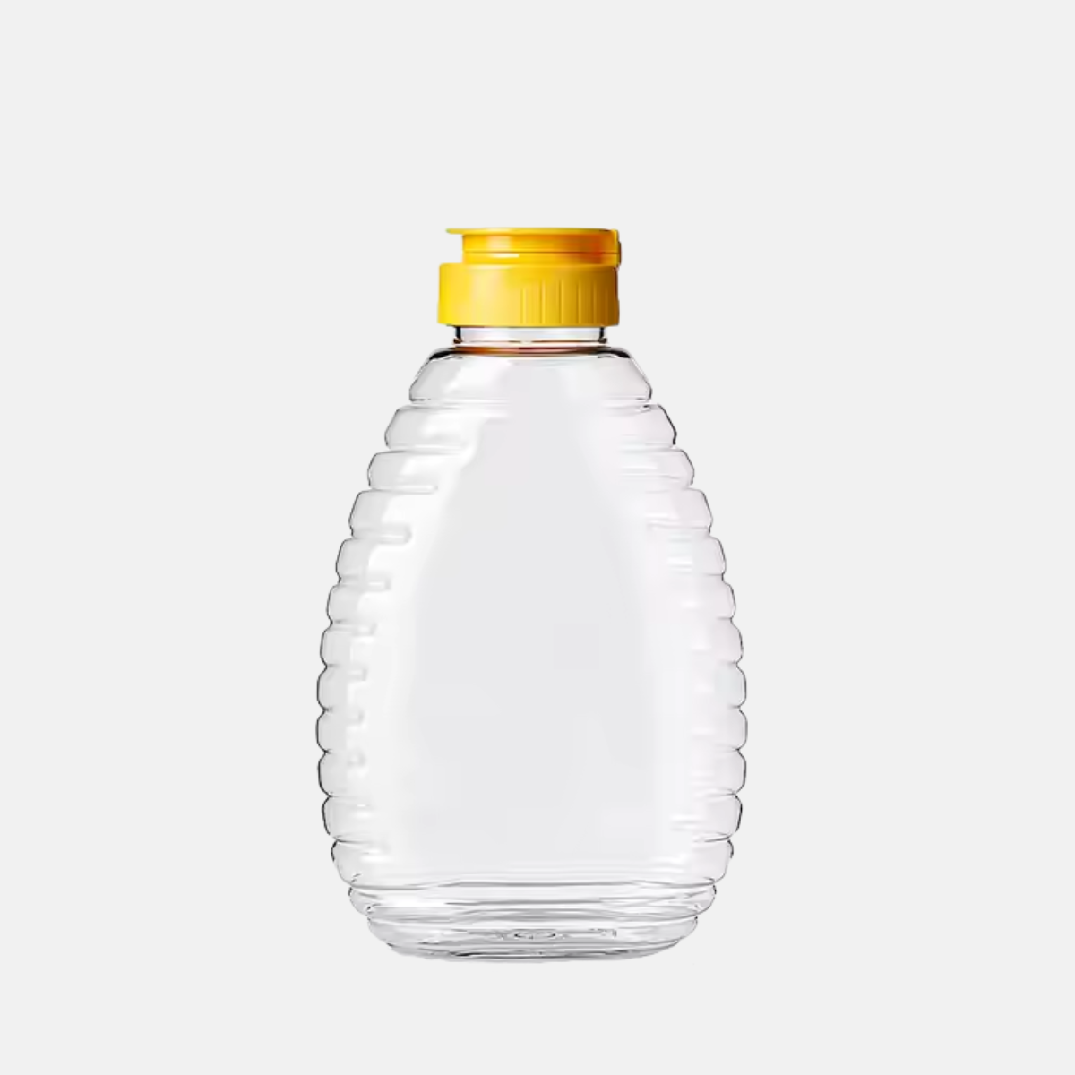 Bouteille à miel en plastique de 384 ml.