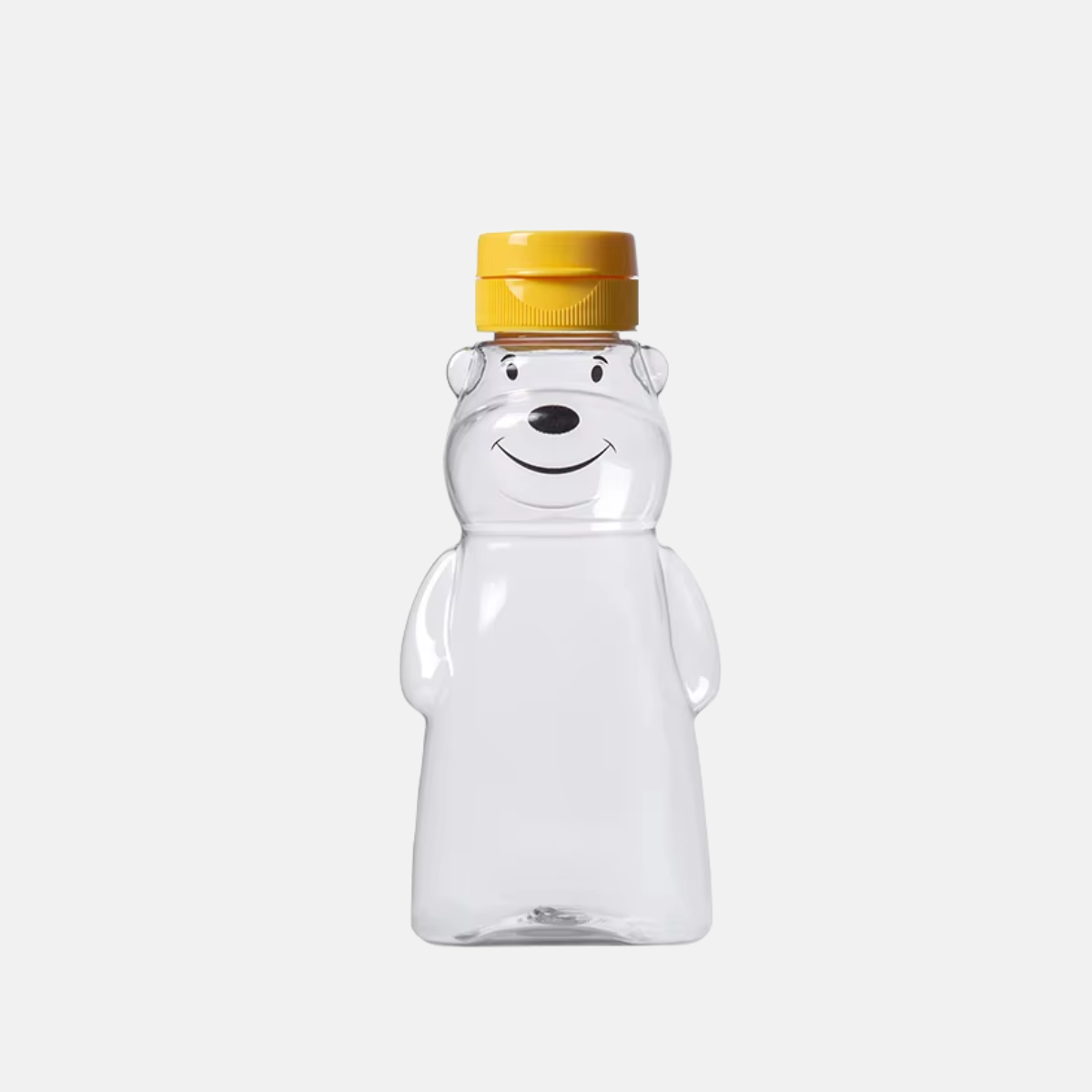 Bouteille à miel en plastique de 188 ml.