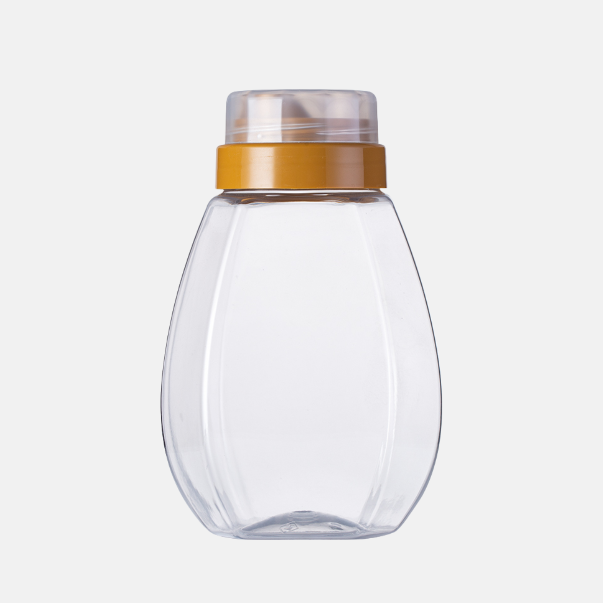 Bouteille à miel en plastique de 755 ml.